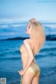 Atittaya Chaiyasing beauty poses hot on the beach with a yellow bikini (41 photos) P7 No.d9fec4